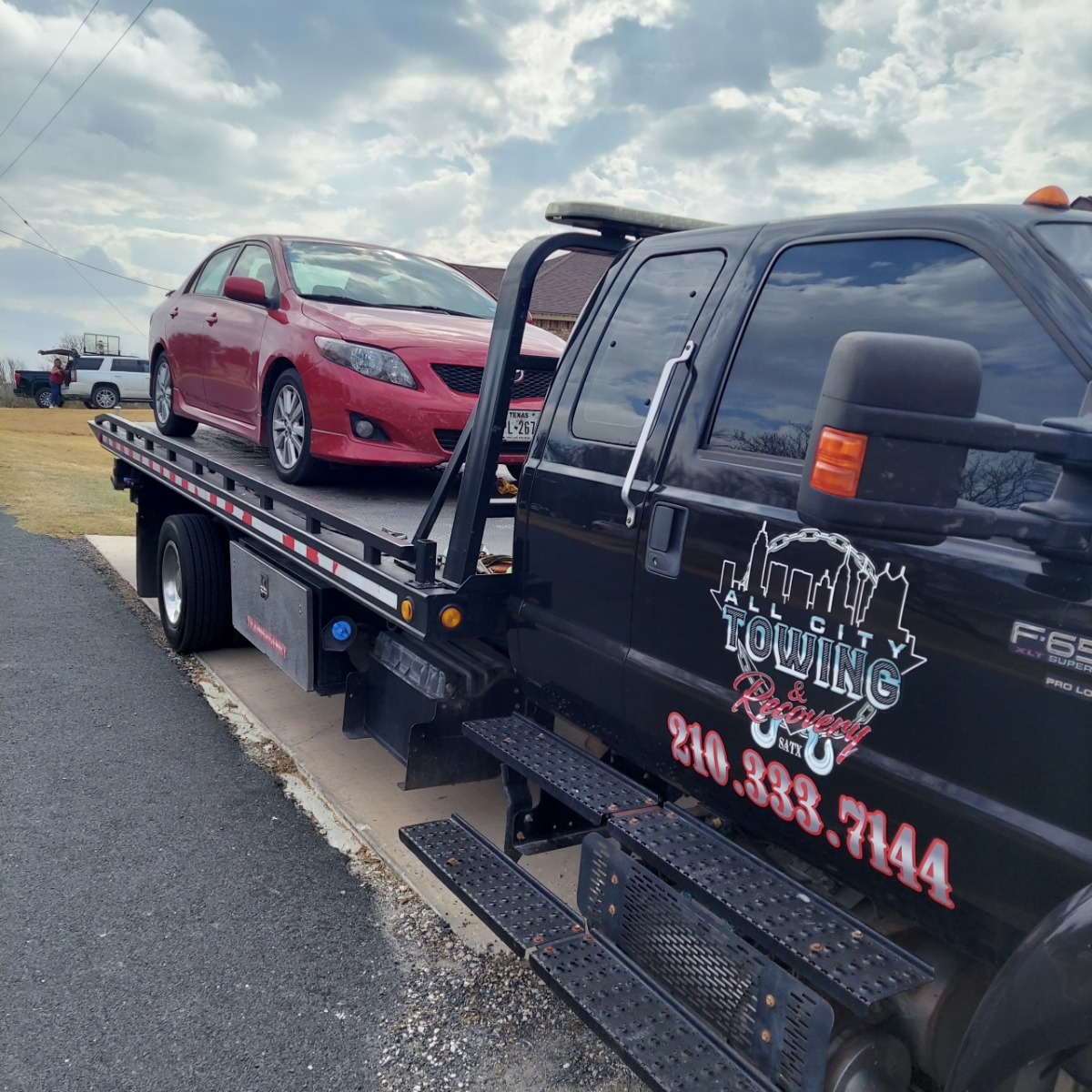 All City Towing and Recovery vehicle on the job